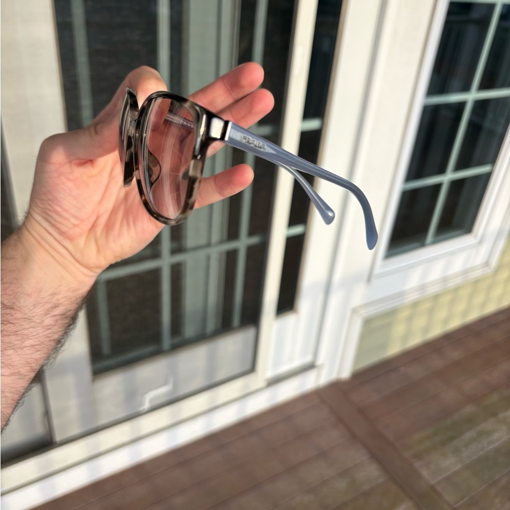 Prada Tortoise Frame Sunglasses with Light Blue Temples